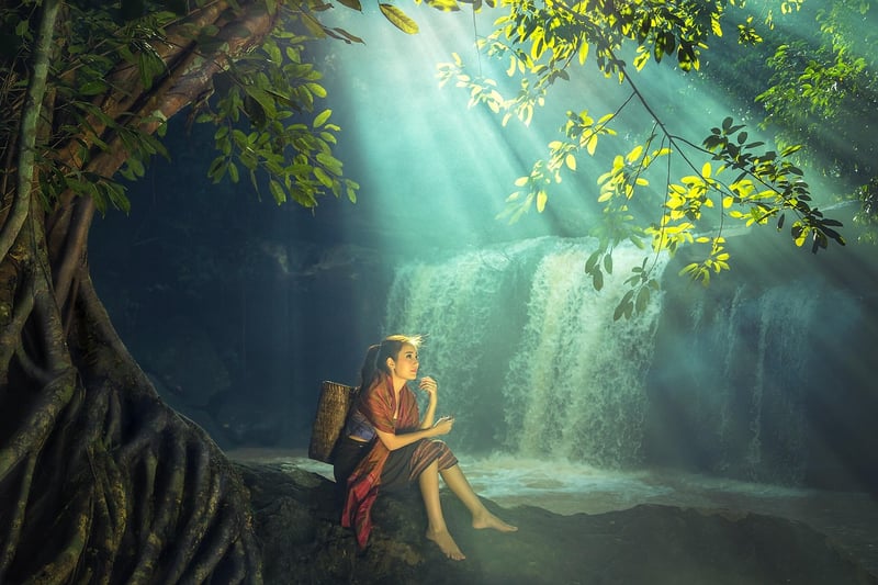 Woman sitting peacefully in nature